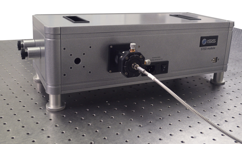 Photo of STED module showing connection to instrument
